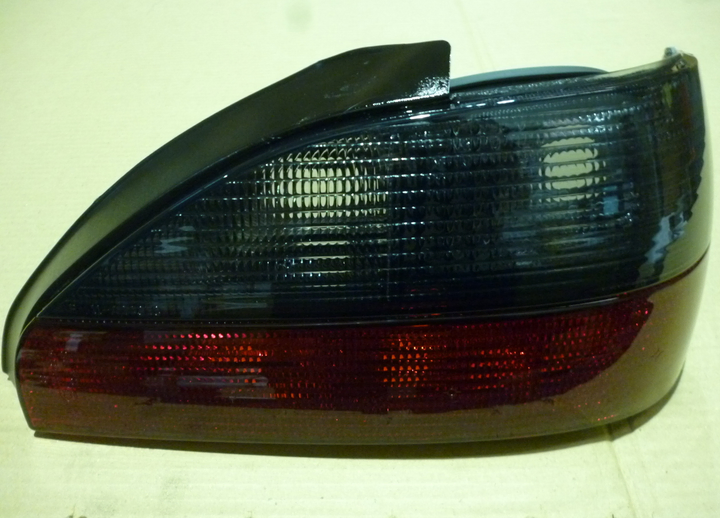 Faro trasero rojo fume 4 ptas. s/vira der - Imagen principal