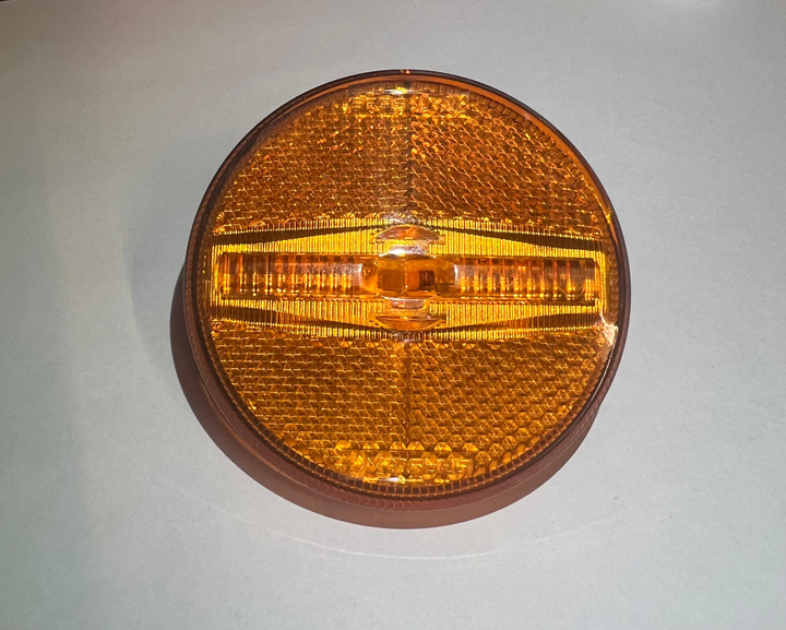 Faro lateral led redondo bivolt ambar (braslux) i/d - Imagen principal