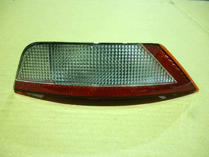 Faro tras.de paragolpe cristal c/ojo de gato m/a der - Imagen principal